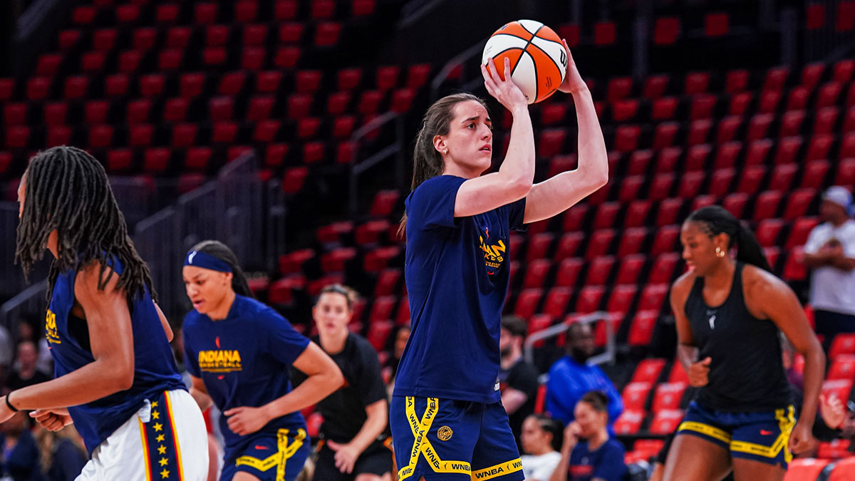Indiana Fever guard Caitlin Clark (22) warms up before the start of the game against the Connecticut Sun at TD Garden.