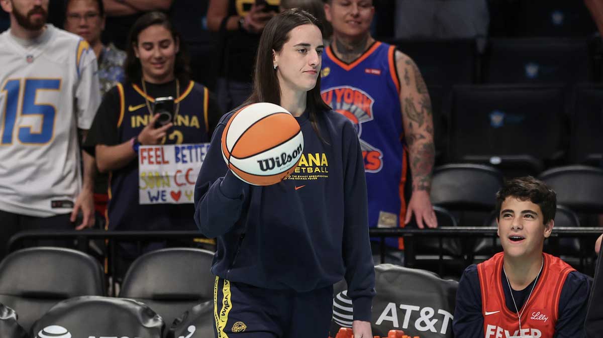 Indiana Fever guard Caitlin Clark (22) walks onto the court prior to the game against the New York Liberty at Barclays Center.