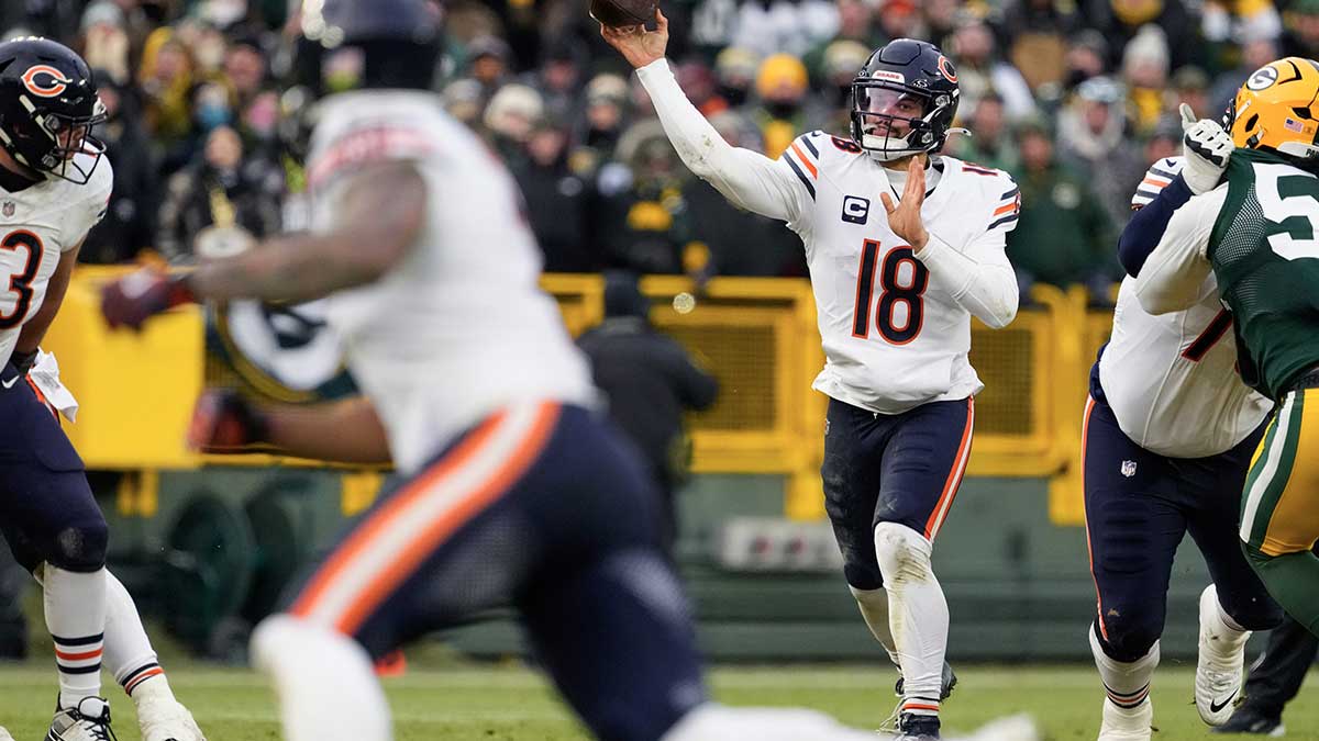 Jan 5, 2025; Green Bay, Wisconsin, USA; Chicago Bears quarterback Caleb Williams (18) during the game against the Green Bay Packers at Lambeau Field.