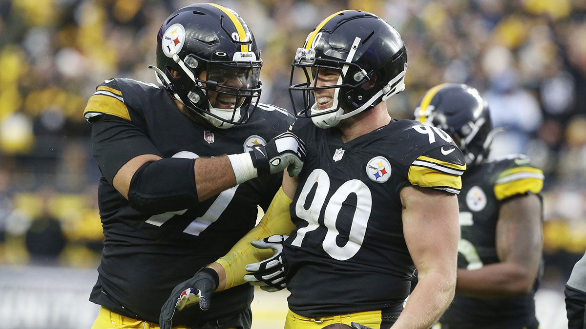 Pittsburgh Steelers defensive end Cameron Heyward (97) and outside linebacker T.J. Watt (90) celebrate after a fumble recovery by Watt against the Tennessee Titans during the fourth quarter at Heinz Field. The Steelers won 19-13.
