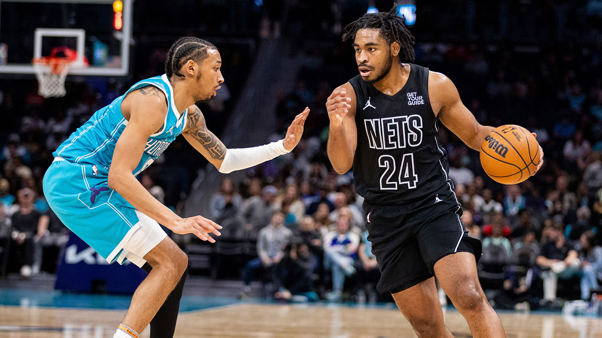Brooklyn Nets guard Cam Thomas (24) drives on Charlotte Hornets guard Nick Smith Jr. (8) during the second quarter at Spectrum Center.