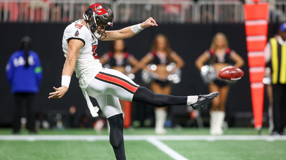 Tampa Bay Buccaneers punter Jake Camarda (5) punts the ball against the Atlanta Falcons in the second half at Mercedes-Benz Stadium.