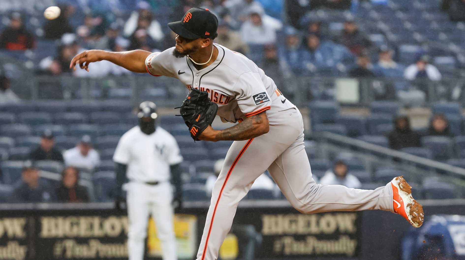 San Francisco Giants pitcher Camilo Doval (75) delivers a pitch against New York Yankees during the eighth inning at Yankee Stadium.