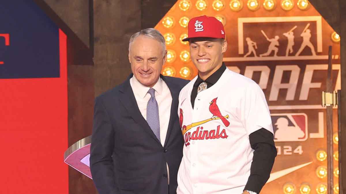 JJ Wetherholt is congratulated by MLB commissioner Rob Manfred after being selected by the St. Louis Cardinals as the seventh player taken during the first round of the MLB Draft at Cowtown Coliseum.
