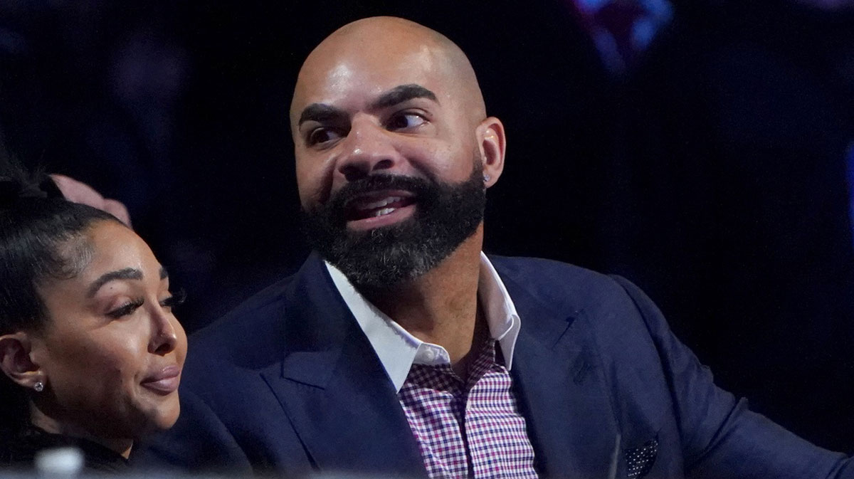 Former NBA player Carlos Boozer looks on in the first half of the in season tournament championship final between the Los Angeles Lakers and the Indiana Pacers at T-Mobile Arena.