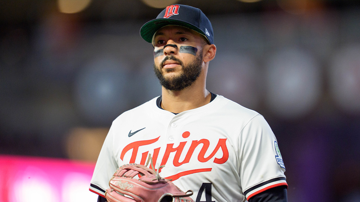 Minnesota Twins shortstop Carlos Correa (4) walks to the dugout after the ninth inning against the Washington Nationals at Target Field