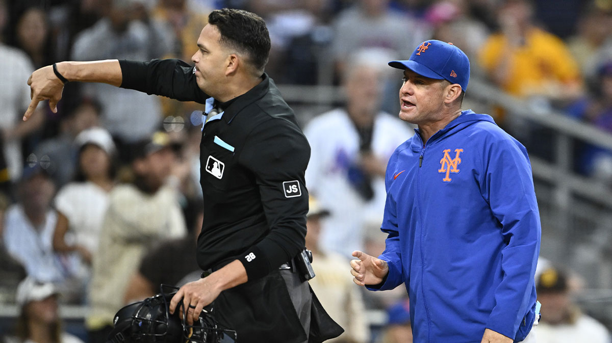 New York Mets manager Carlos Mendoza (64) is ejected by umpire Emil Jimenez (82) after a called strike out during the third inning against the San Diego Padres at Petco Park.
