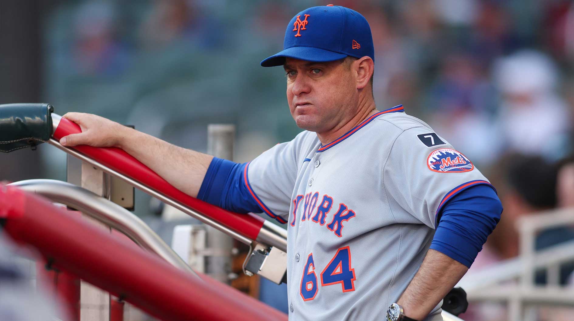 New York Mets manager Carlos Mendoza (64) in the dugout before a game against the Atlanta Braves at Truist Park.