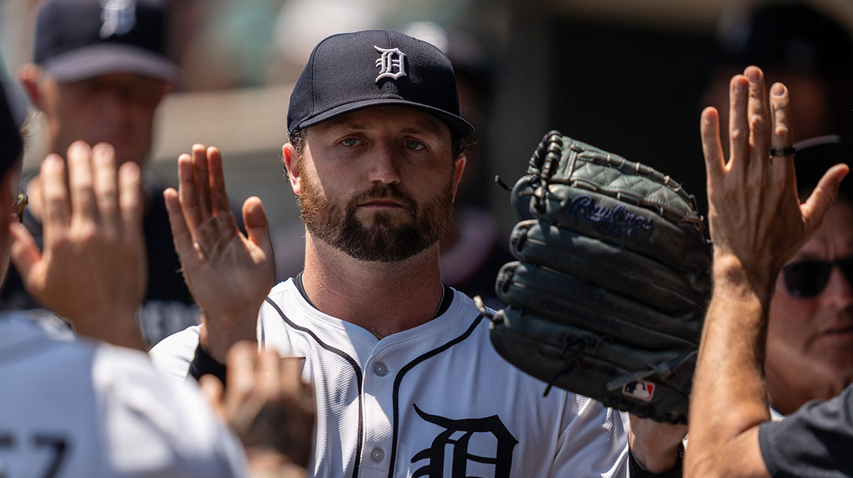 Detroit Tigers Casey Mize celebrates with his teammates in the dugout during a game against the Twins