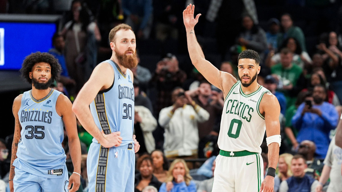 Celtics' Jayson Tatum (0) hypes up the crowd as Boston fans chant for the Celtics as time expires and they defeated the Grizzlies 117-103 at FedExForum in Memphis, Tenn., on Monday, March 31, 2025