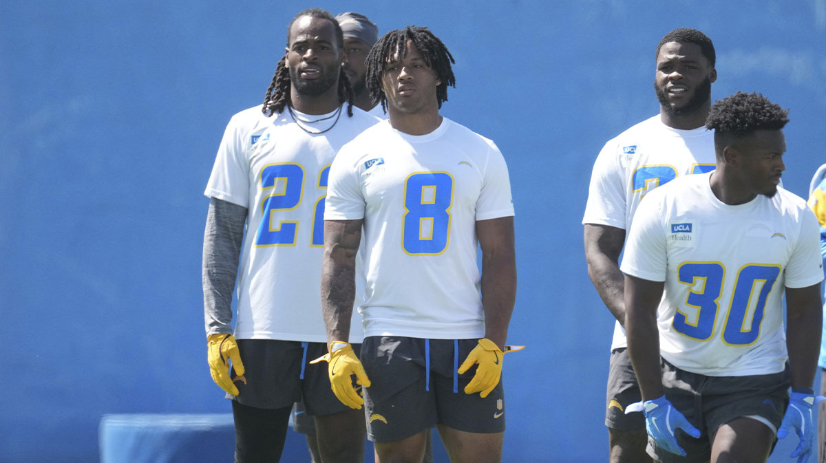 Los Angeles Chargers running backs Najee Harris (22), Omarion Hampton (8) and Kimani Vidal (30) look on during offseason workouts at The Bolt.