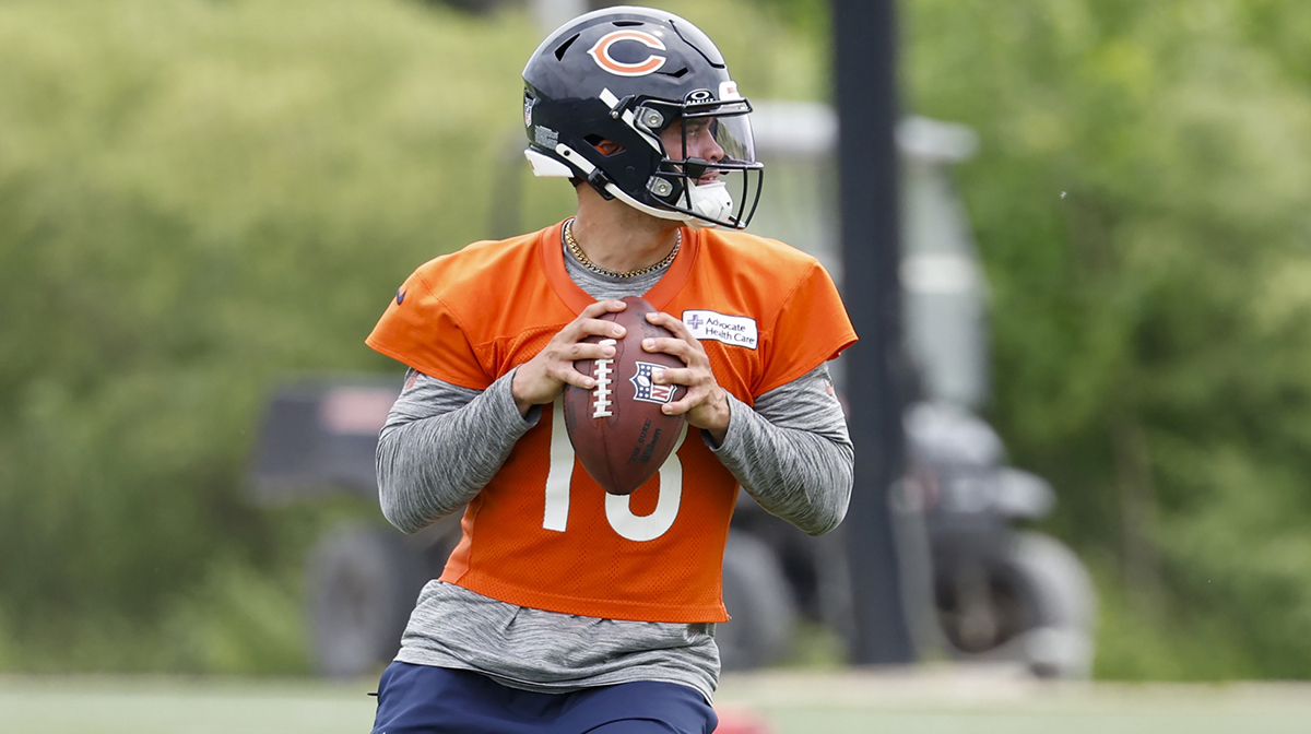 Chicago Bears quarterback Caleb Williams (18) looks to pass the ball during minicamp at Halas Hall.
