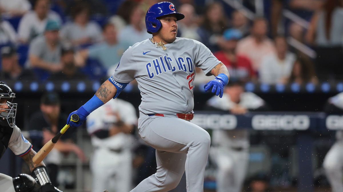 Chicago Cubs designated hitter Moises Ballesteros (25) hits an RBI single against the Miami Marlins during the sixth inning at loanDepot Park.