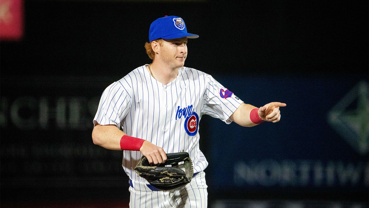 Iowa Cubs' Owen Caissie (17) makes his way to the dugout.