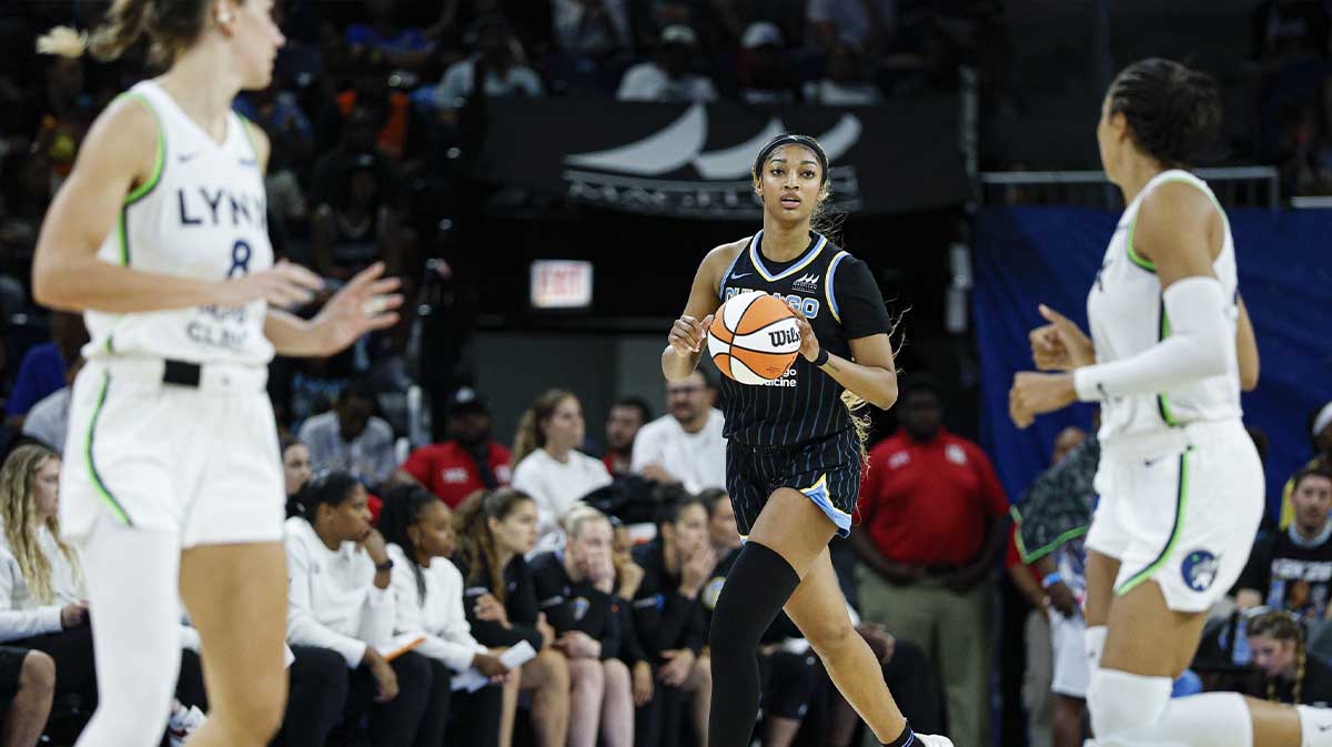 Chicago Sky forward Angel Reese (5) brings the ball up court during the second half of a WNBA game against the Minnesota Lynx at Wintrust Arena.