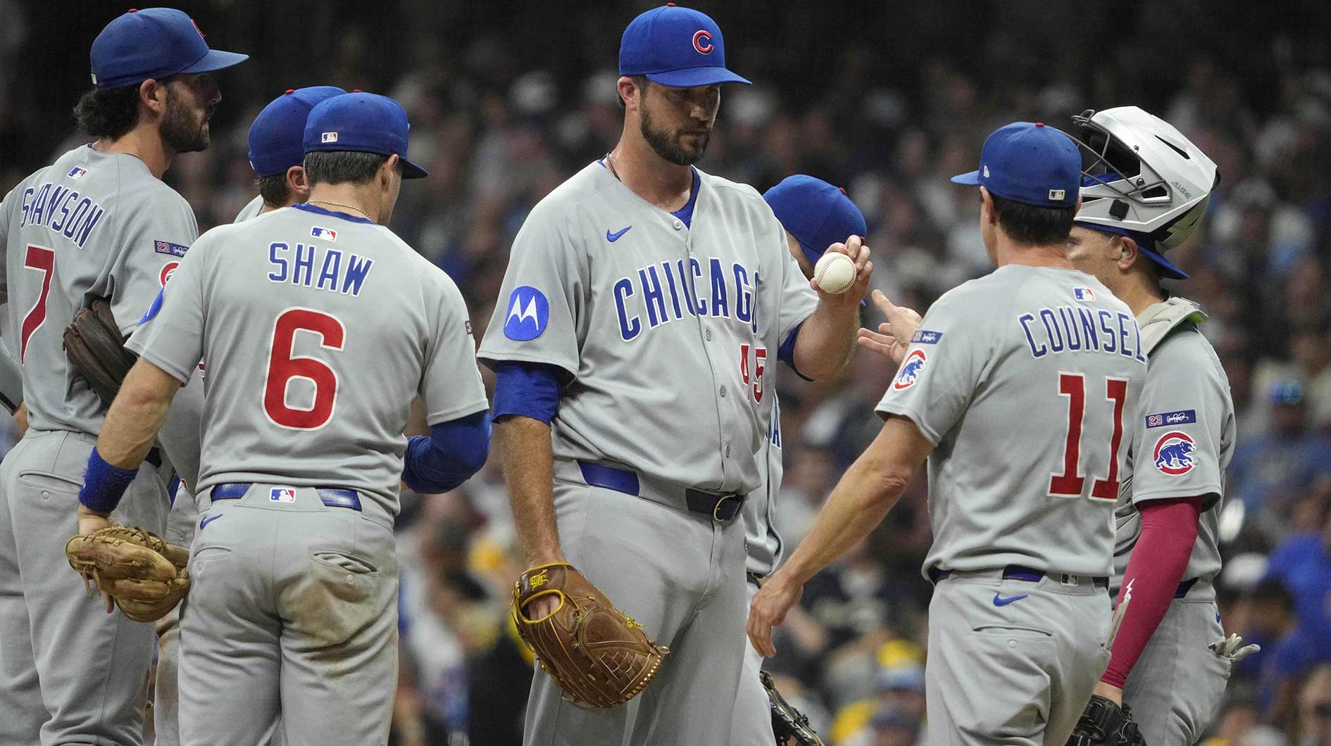 Chicago Cubs pitcher Drew Pomeranz (45) is taken out of the game by Chicago Cubs manager Craig Counsell (11) in the fifth inning against the Milwaukee Brewers at American Family Field.