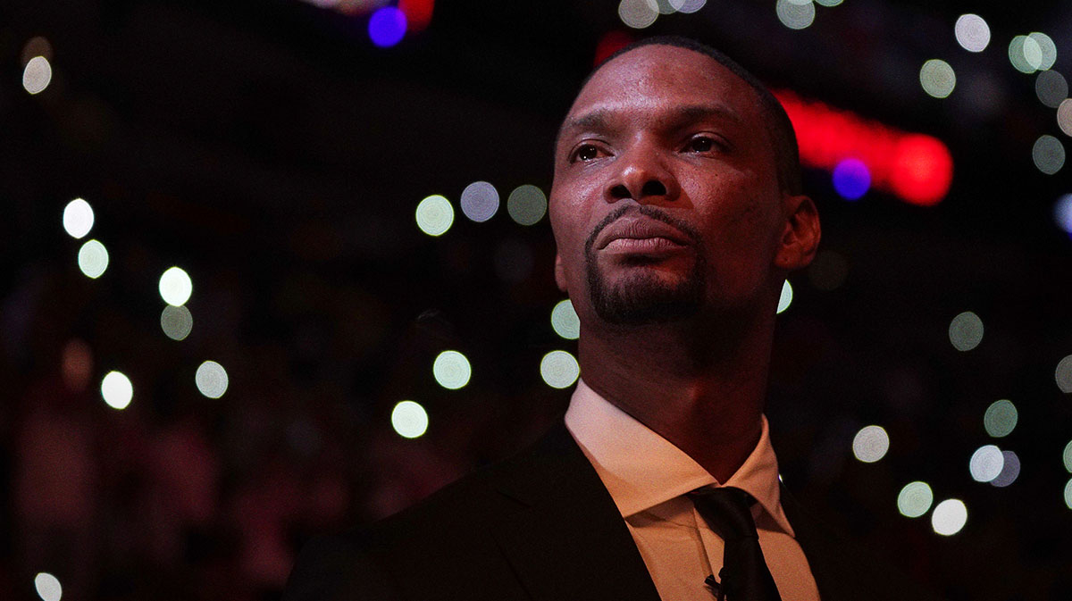 Former Miami Heat player Chris Bosh looks on prior to the game between the Miami Heat and the Orlando Magic at American Airlines Arena.