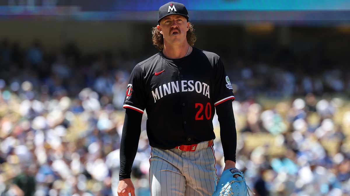 Minnesota Twins starting pitcher Chris Paddack (20) walks back to the dugout after pitching sixth inning against the Los Angeles Dodgers at Dodger Stadium.
