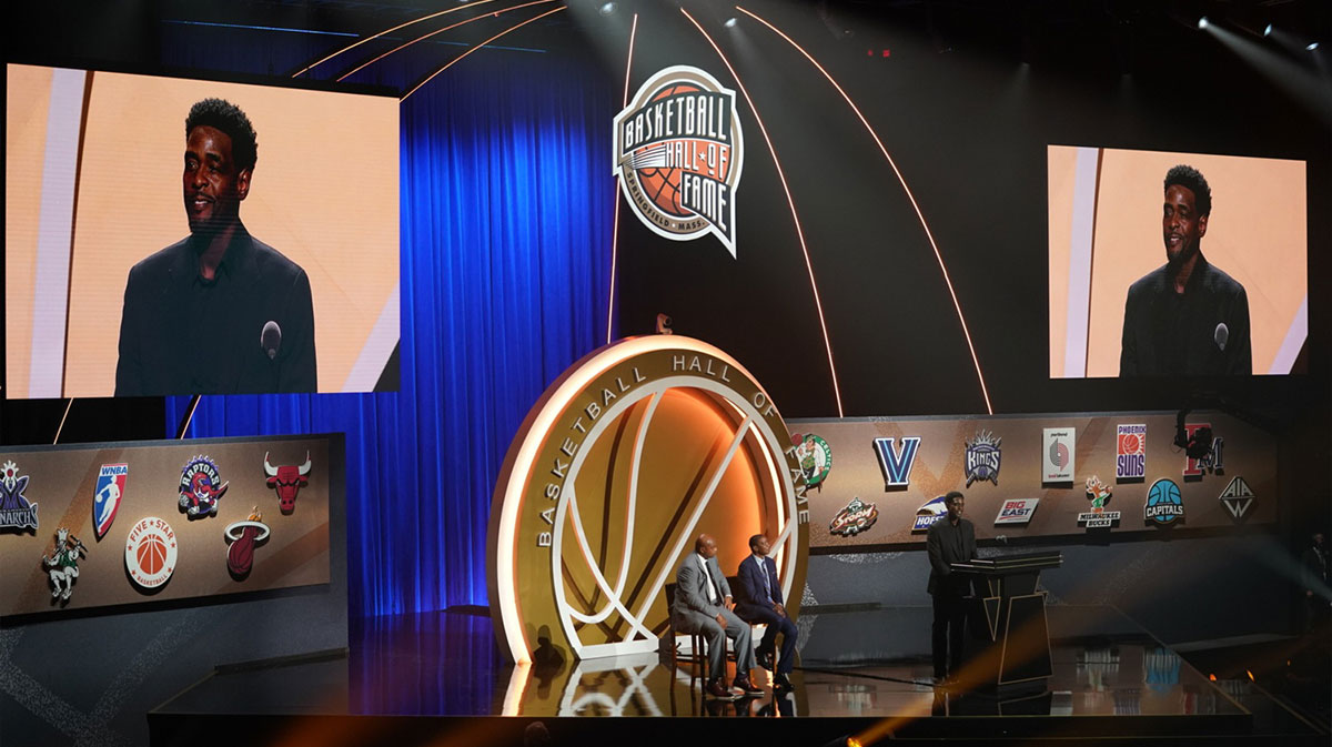 Class of 2021 inductee Chris Webber speaks alongside presenters Charles Barkley and Isiah Thomas during the Naismith Memorial Basketball Hall of Fame Enshrinement at MassMutual Center.