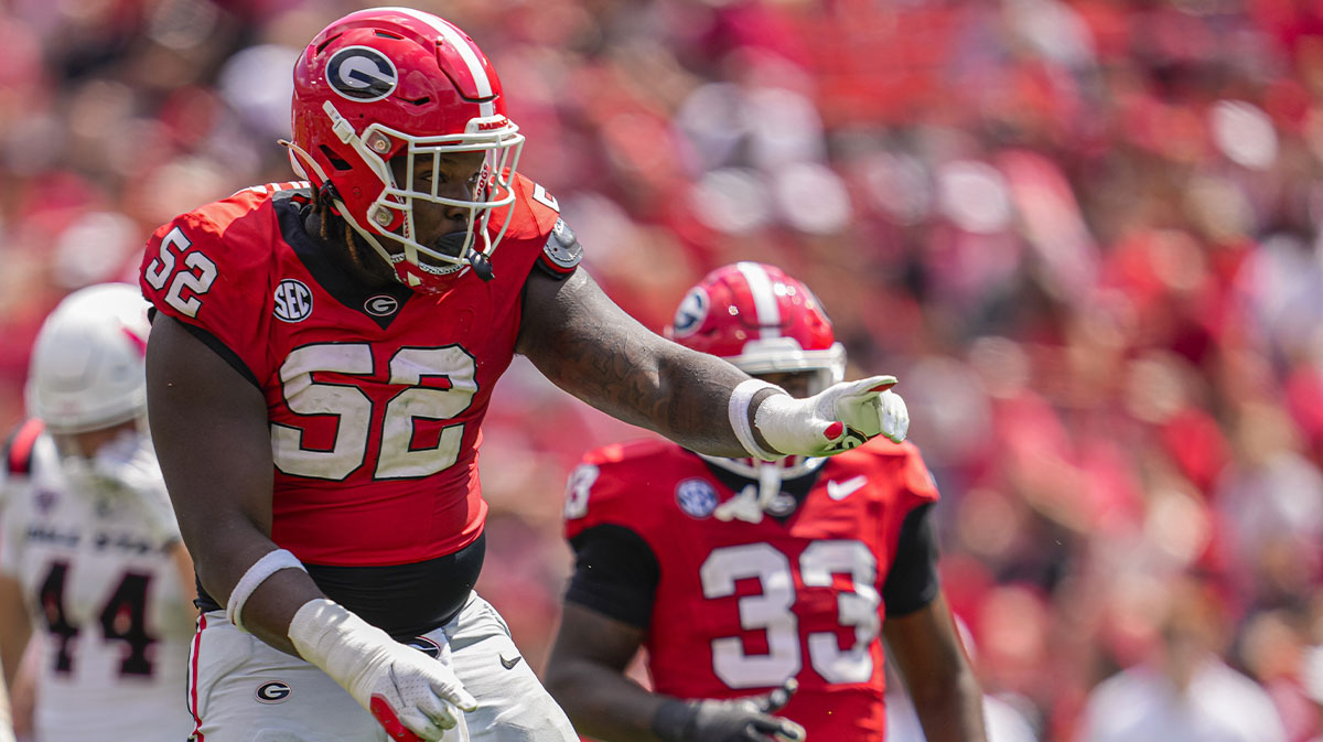Sep 9, 2023; Athens, Georgia, USA; Georgia Bulldogs defensive lineman Christen Miller (52) reacts after making a tackle against the Ball State Cardinals during the second half at Sanford Stadium. 