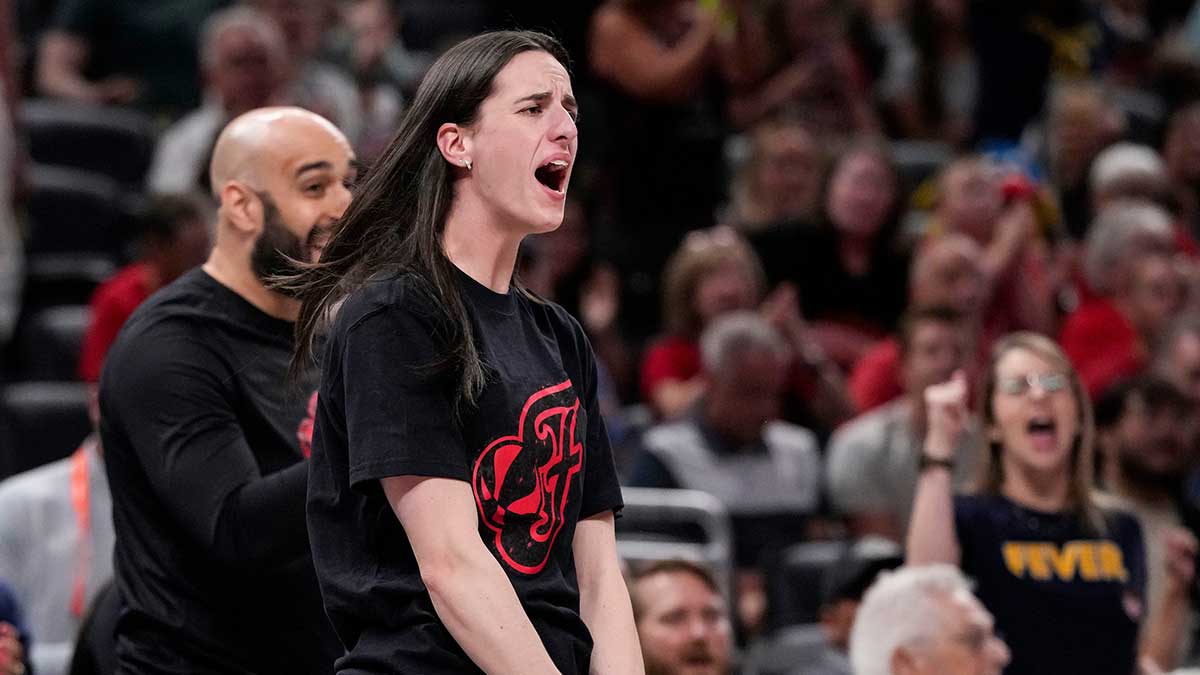Indiana Fever guard Caitlin Clark (22) yells in excitement Wednesday, July 30, 2025, during the game at Gainbridge Fieldhouse in Indianapolis.