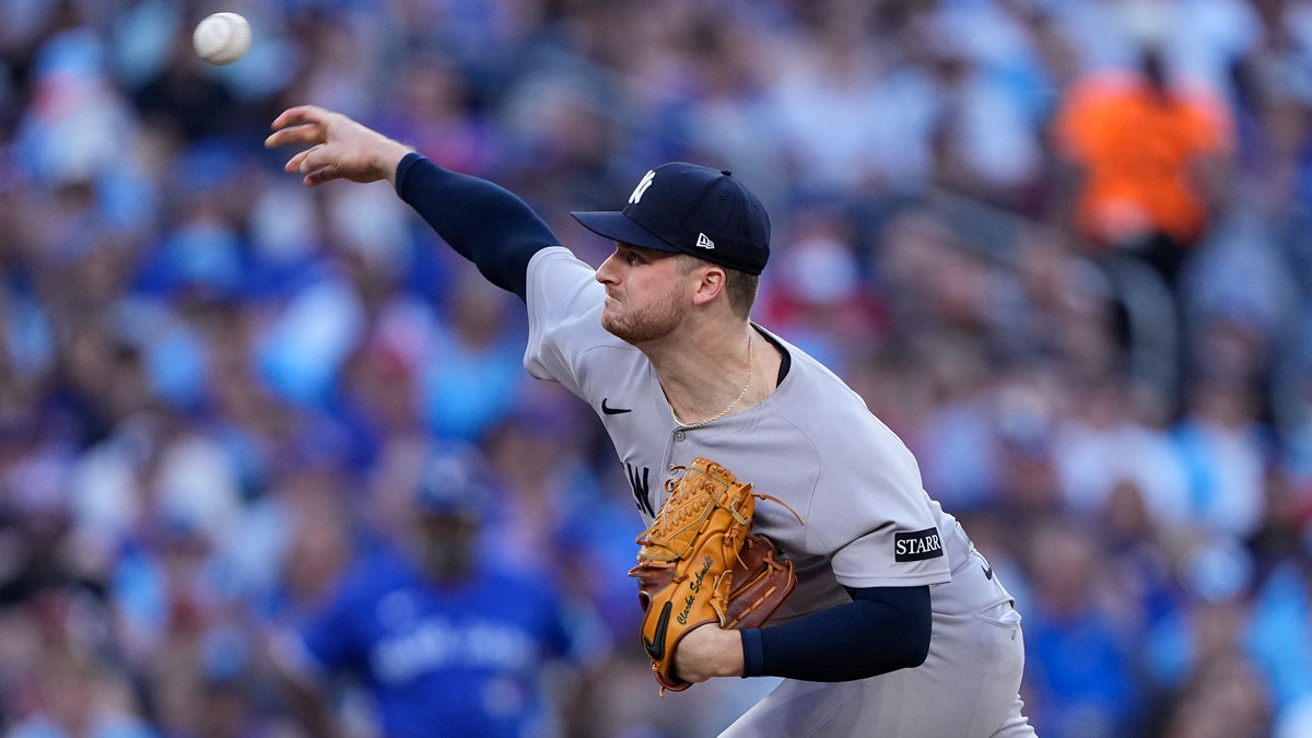 New York Yankees starting pitcher Clarke Schmidt (36) pitches to the Toronto Blue Jays during the first inning at Rogers Centre.