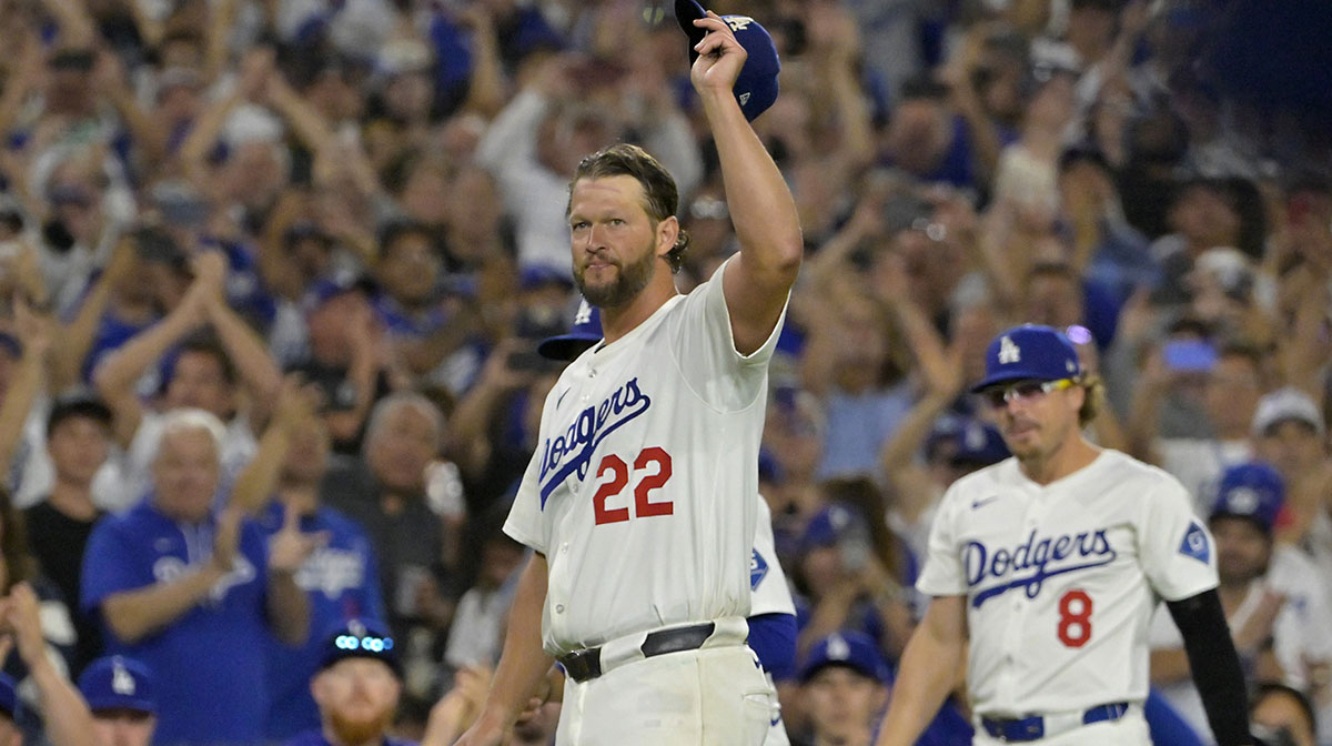 Los Angeles Dodgers starting pitcher Clayton Kershaw (22) acknowledges the crowd after striking out Chicago White Sox third baseman Vinny Capra (41) for his 3000th career strike at Dodger Stadium.