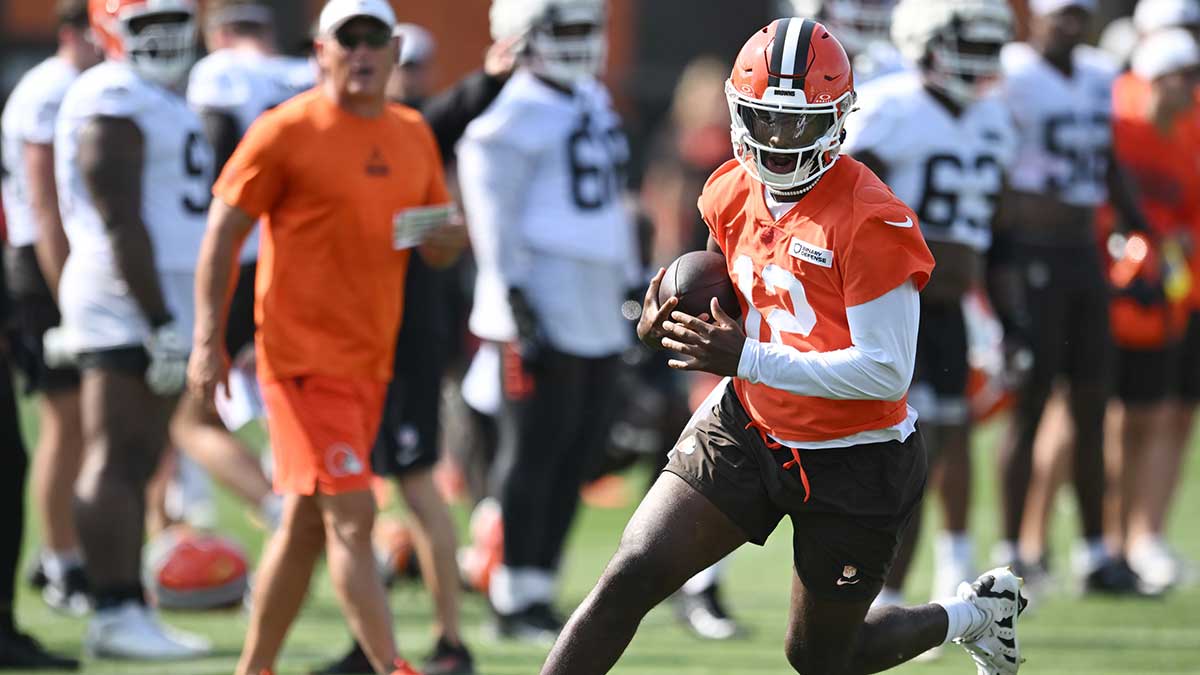 Cleveland Browns quarterback Shedeur Sanders (12) scrambles during training camp at CrossCountry Mortgage Campus.