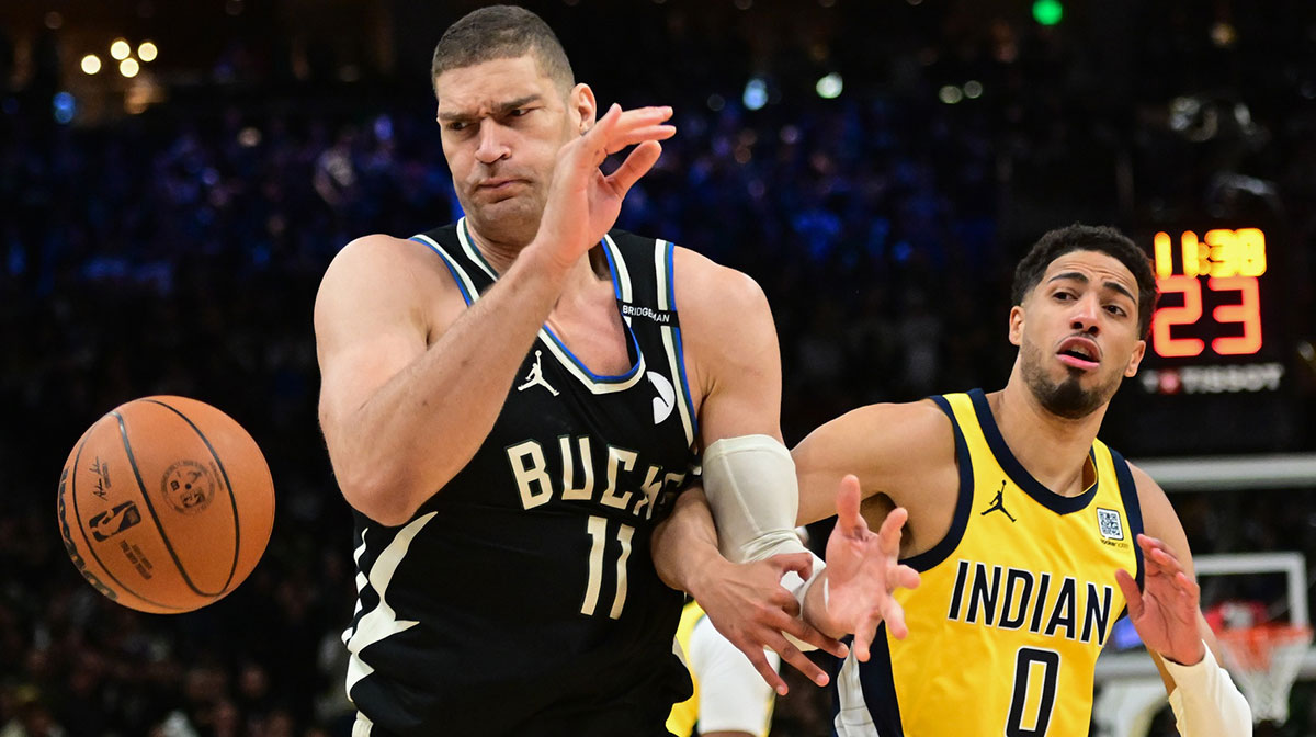 Milwaukee Bucks center Brook Lopez (11) looks for a rebound against Indiana Pacers guard Tyrese Haliburton (0) in the first quarter during game four of first round for the 2024 NBA Playoffs at Fiserv Forum.