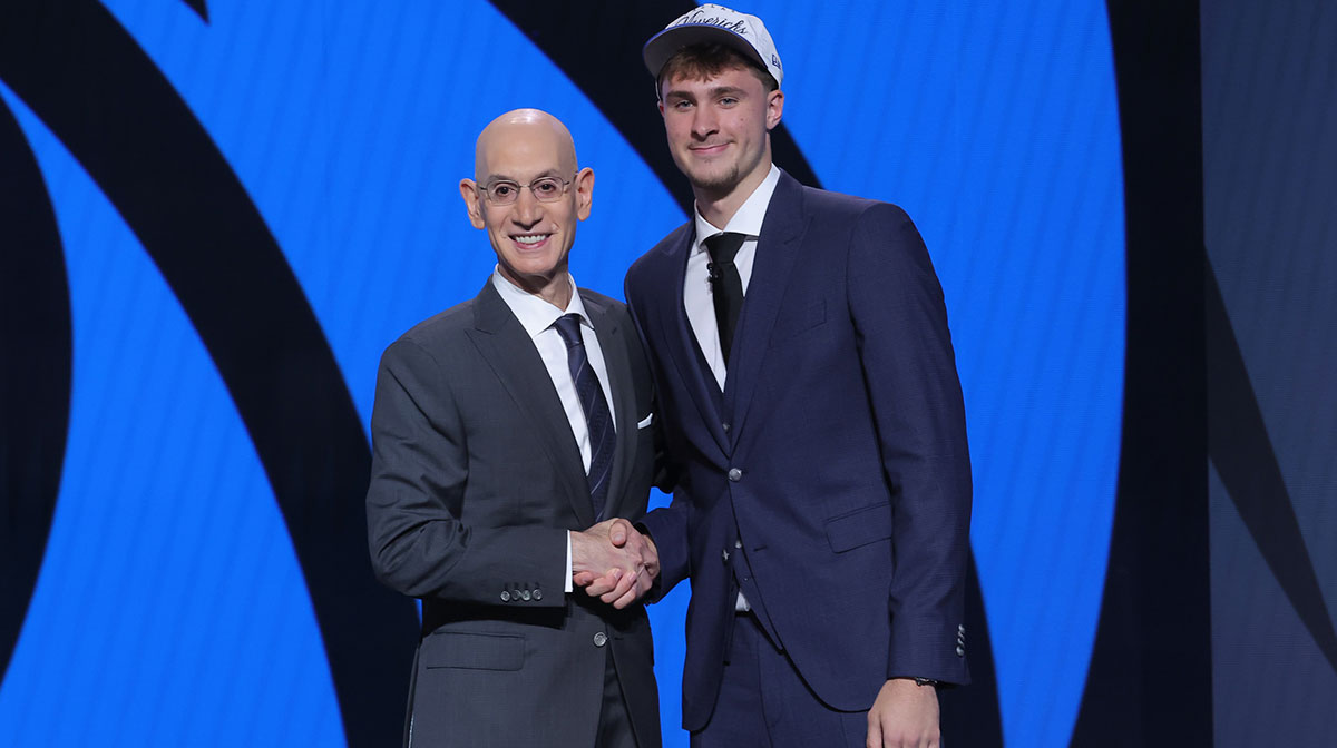 Cooper Flagg poses with NBA commissioner Adam Silver after being selected as first overall by the Dallas Mavericks in the first round of the 2025 NBA Draft at Barclays Center.