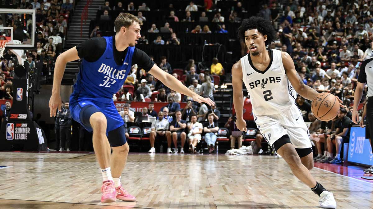 Dallas Mavericks forward Cooper Flagg (32) defends against San Antonio Spurs guard Dylan Harper (2) in the second quarter of their game at Thomas & Mack Center.