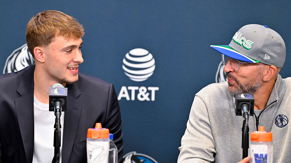 Dallas Mavericks first overall pick Cooper Flagg (left) smiles with head coach Jason Kidd (right) at a press conference at the Dallas Mavericks Practice Facility.