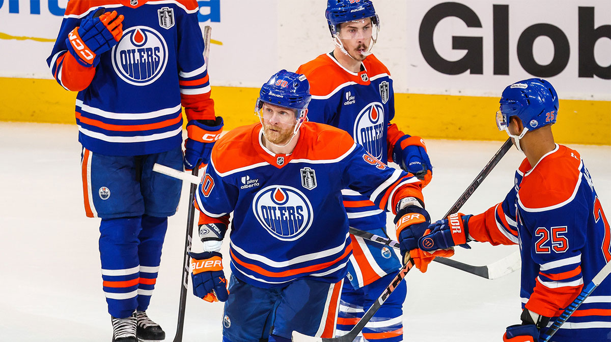 Edmonton Oilers right wing Corey Perry (90) celebrates his goal with teammates against the Florida Panthers during the third period in game five of the 2025 Stanley Cup Final at Rogers Place.