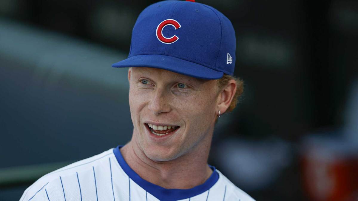 Chicago Cubs center fielder Pete Crow-Armstrong (4) smiles before a baseball game against the Cleveland Guardians at Wrigley Field.