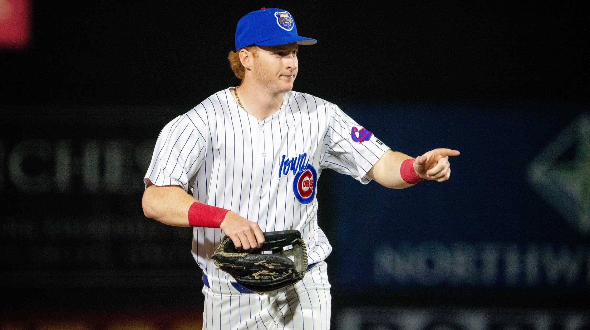 Iowa Cubs' Owen Caissie (17) makes his way to the dugout