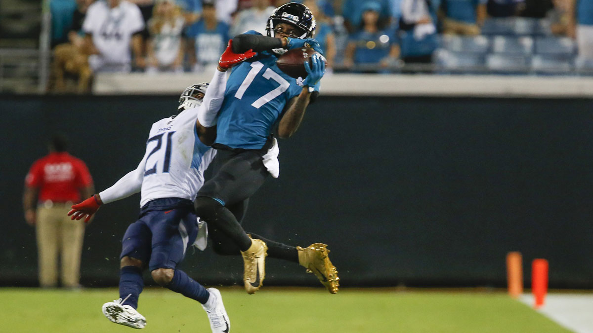 Sep 19, 2019; Jacksonville, FL, USA; Tennessee Titans cornerback Malcolm Butler (21) guards against the catch by Jacksonville Jaguars wide receiver D.J. Chark (17) during the second half at TIAA Bank Field. 