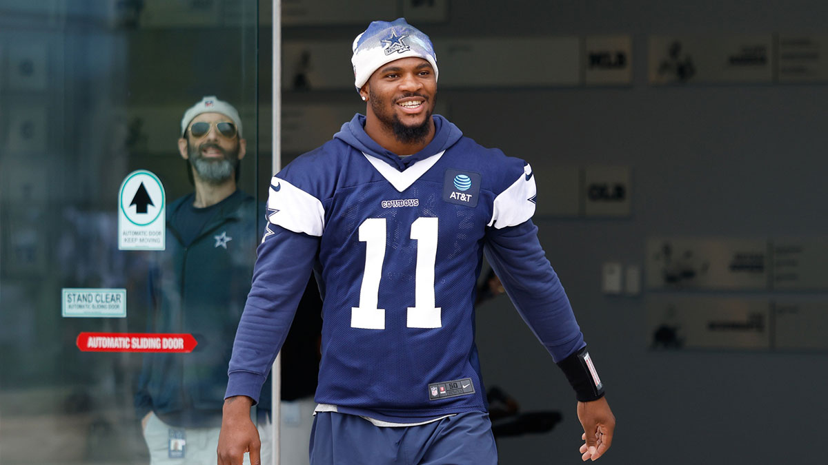 Dallas Cowboys defensive end Micah Parsons (11) walks onto the practice field at the Ford Center at the Star Training Facility in Frisco, Texas.