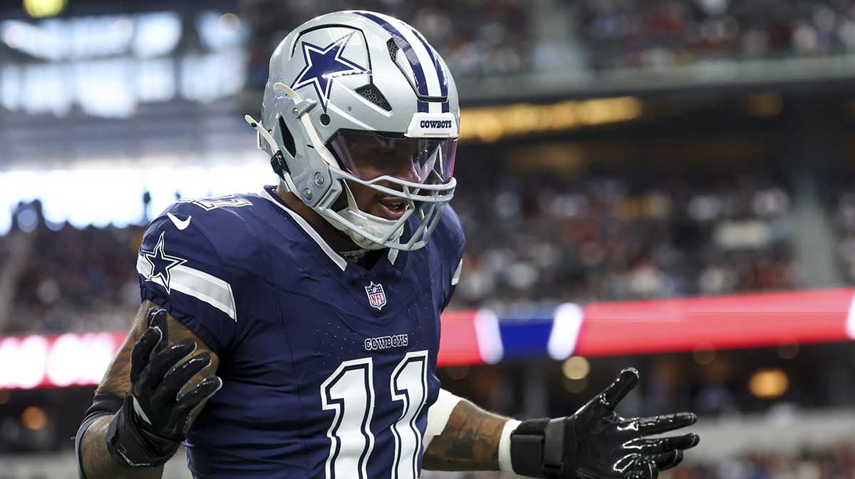 Dallas Cowboys linebacker Micah Parsons (11) celebrates after a sack during the first quarter against the Washington Commanders at AT&T Stadium.