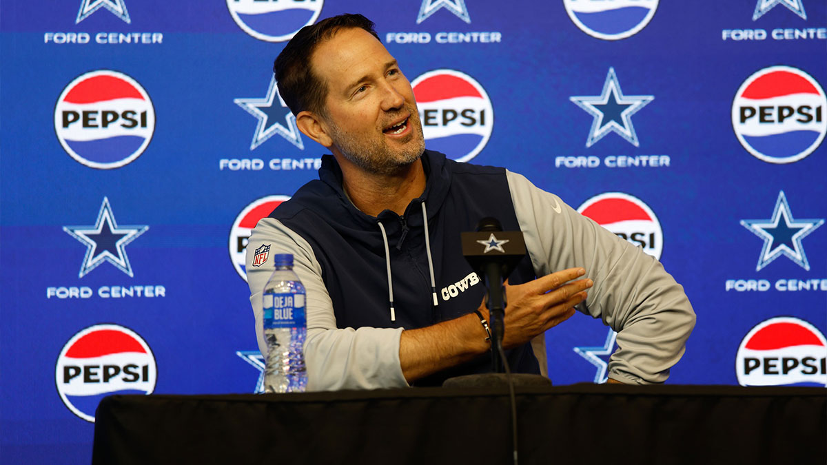 Dallas Cowboys head coach Brian Schottenheimer addresses the media before practice at the Ford Center at the Star Training Facility in Frisco, Texas.