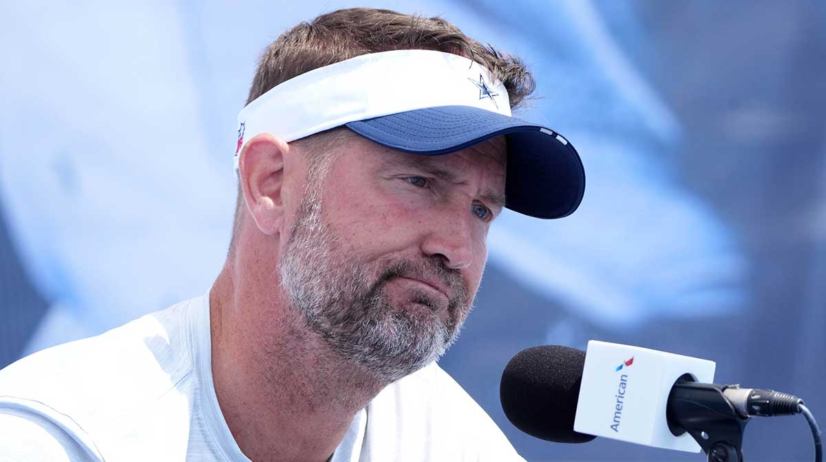 Dallas Cowboys coach Brian Schottenheimer at training camp press conference at the River Ridge Fields.