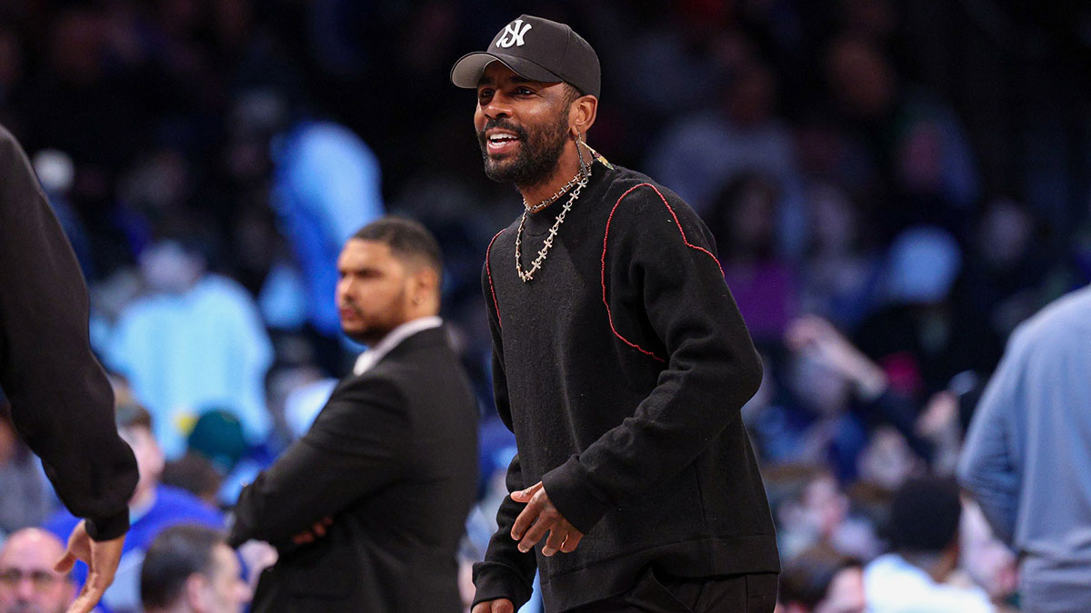 Dallas Mavericks guard Kyrie Irving (11) looks on during the first quarter against the Brooklyn Nets at Barclays Center.