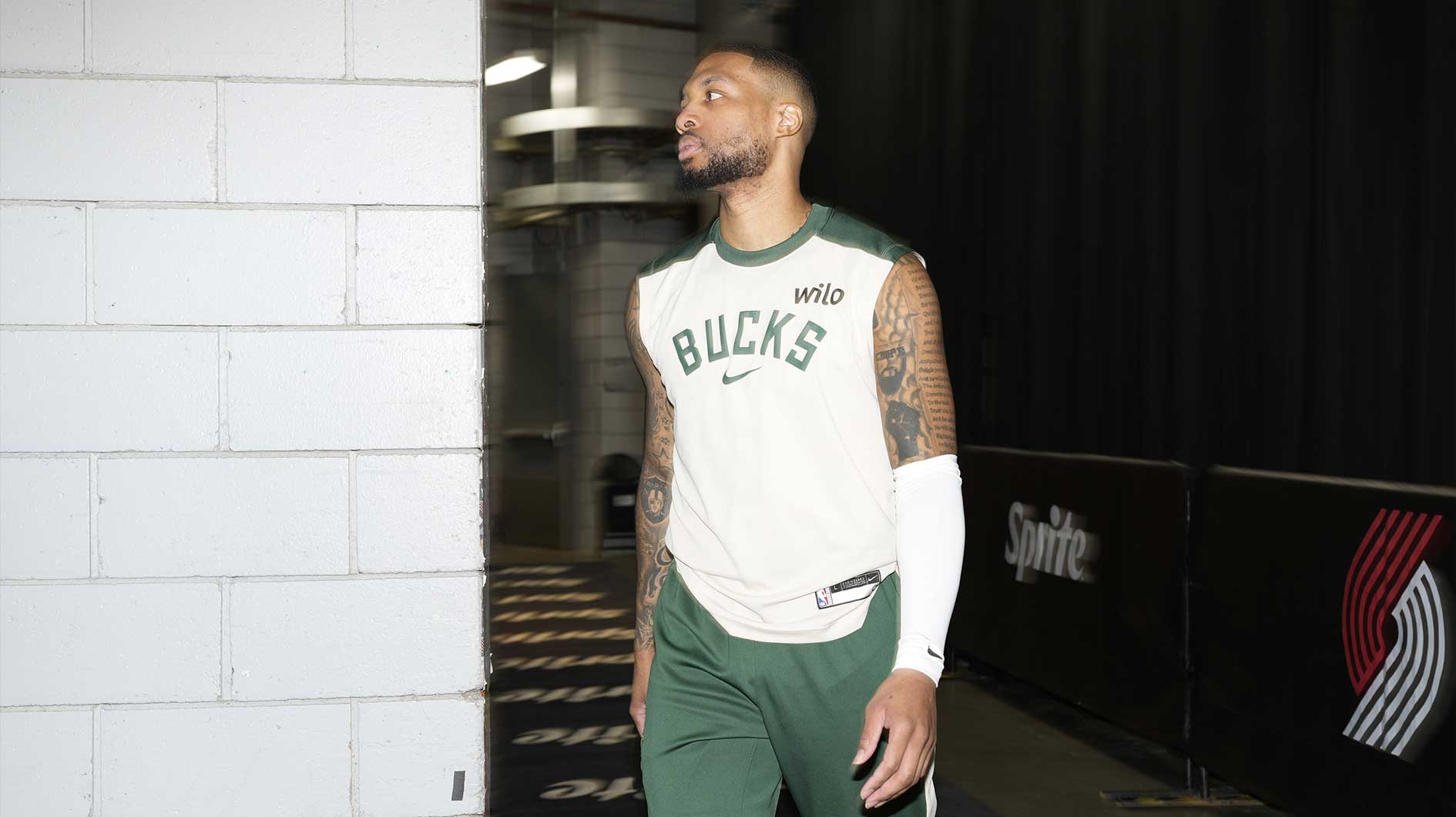 Milwaukee Bucks point guard Damian Lillard (0) walks through the tunnel before the game against the Portland Trail Blazers at Moda Center.