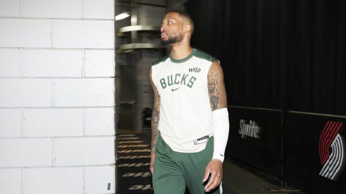 Milwaukee Bucks point guard Damian Lillard (0) walks through the tunnel before the game against the Portland Trail Blazers at Moda Center.