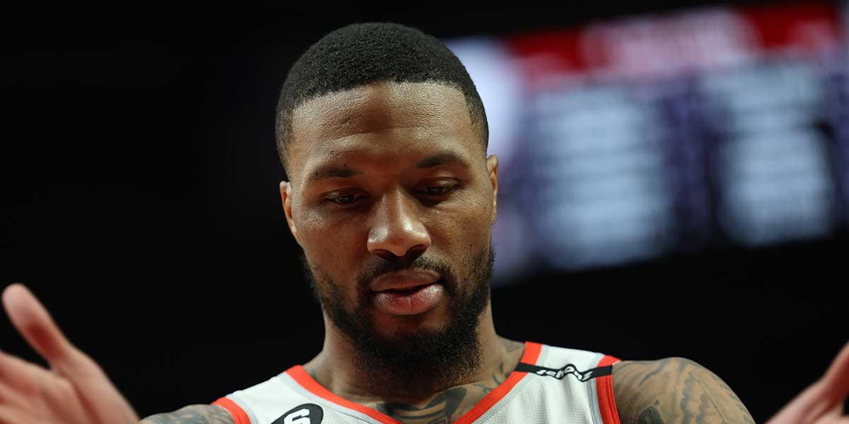 Portland Trail Blazers guard Damian Lillard (0) gathers himself after a play in the second half against the Milwaukee Bucks at Moda Center.