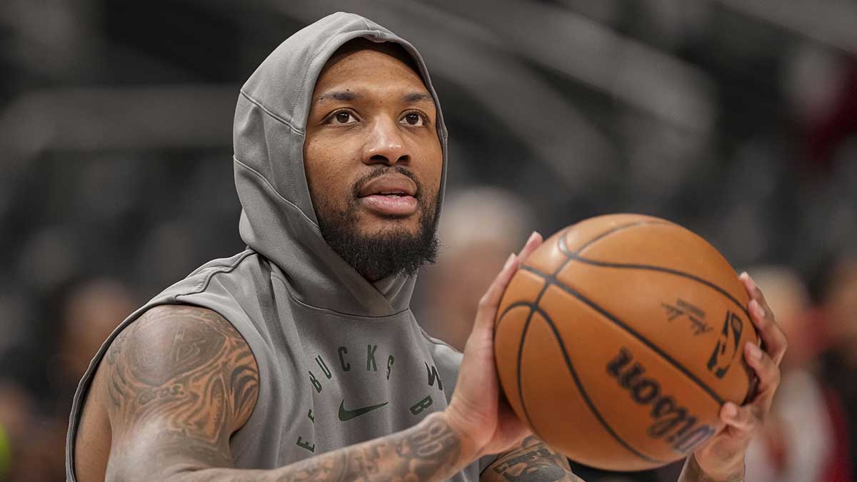 Milwaukee Bucks guard Damian Lillard (0) shown on the court prior to the game against the Atlanta Hawks at State Farm Arena.