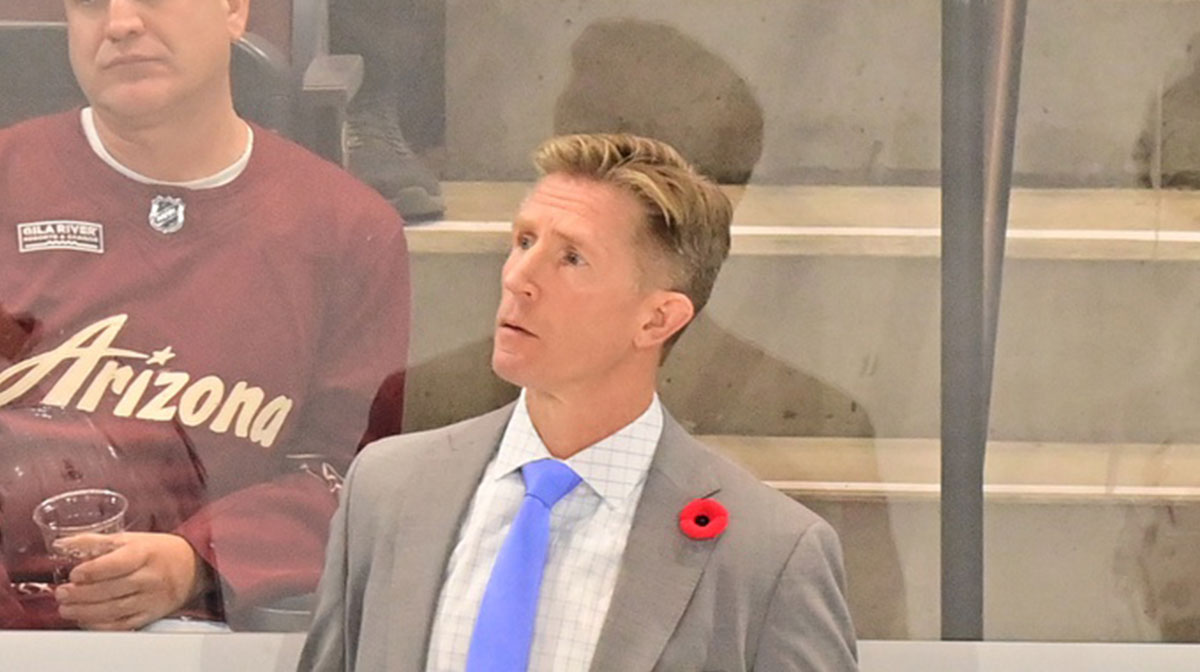 Seattle Kraken head coach Dave Hakstol looks on in the first period against the Arizona Coyotes at Mullett Arena