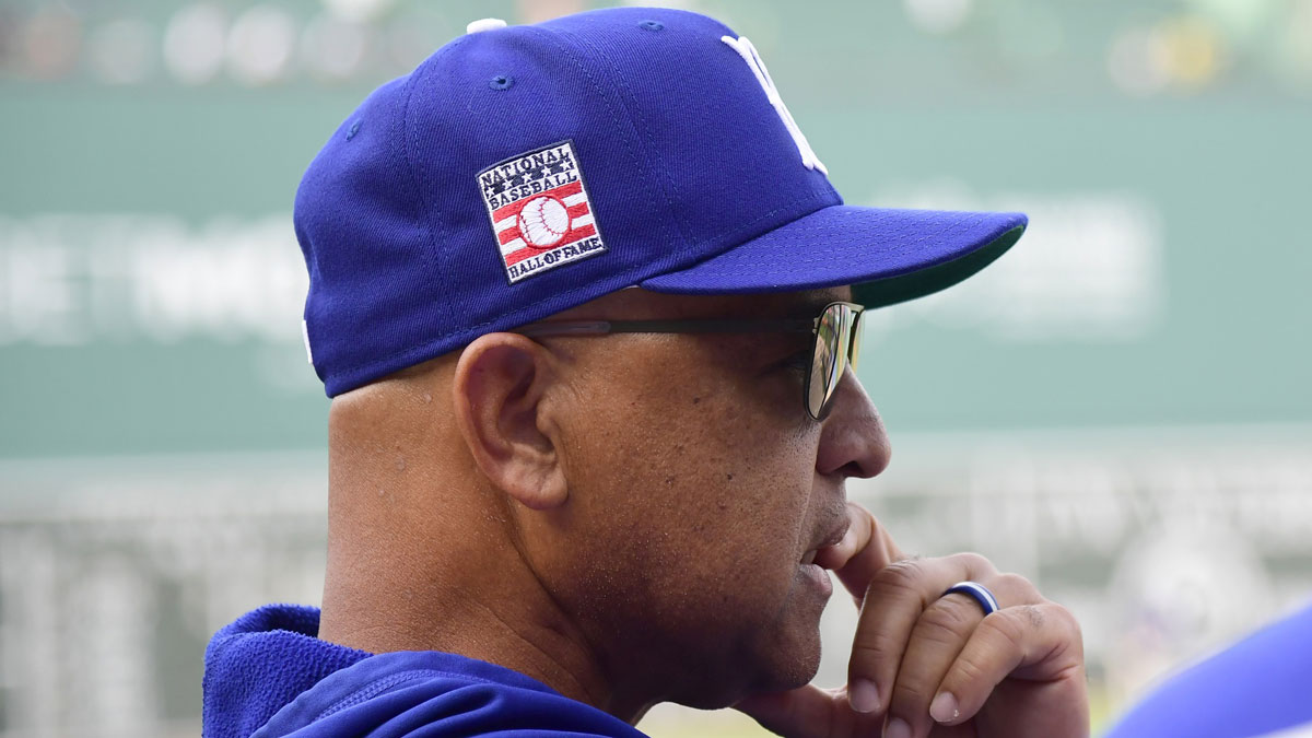 Los Angeles Dodgers manager Dave Roberts watches batting practice prior to a game against the Boston Red Sox at Fenway Park.