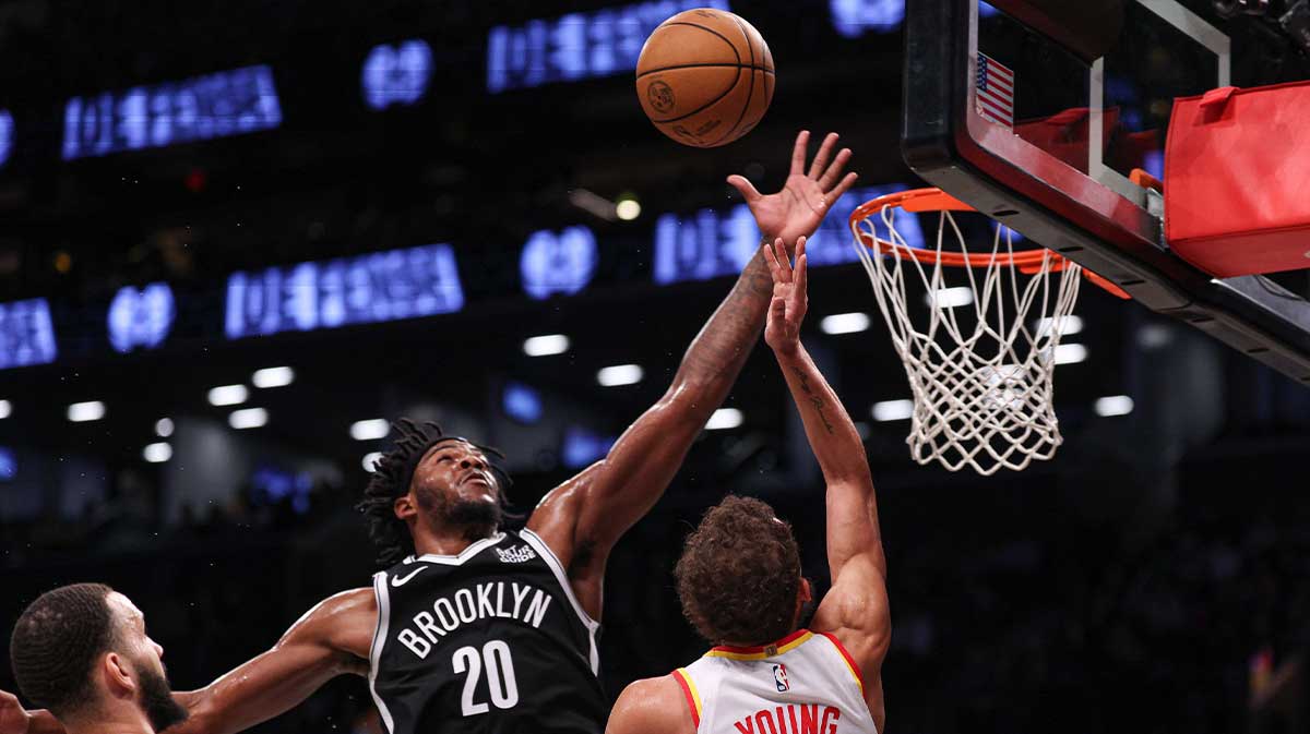 Brooklyn Nets center Day'Ron Sharpe (20) blocks a shot by Atlanta Hawks guard Trae Young (11) during the first half at Barclays Center.