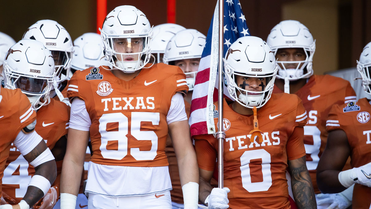 Texas Longhorns tight end Gunnar Helm (85) and wide receiver DeAndre Moore Jr. (0) against the Clemson Tigers during the CFP National playoff first round at Darrell K Royal-Texas Memorial Stadium.