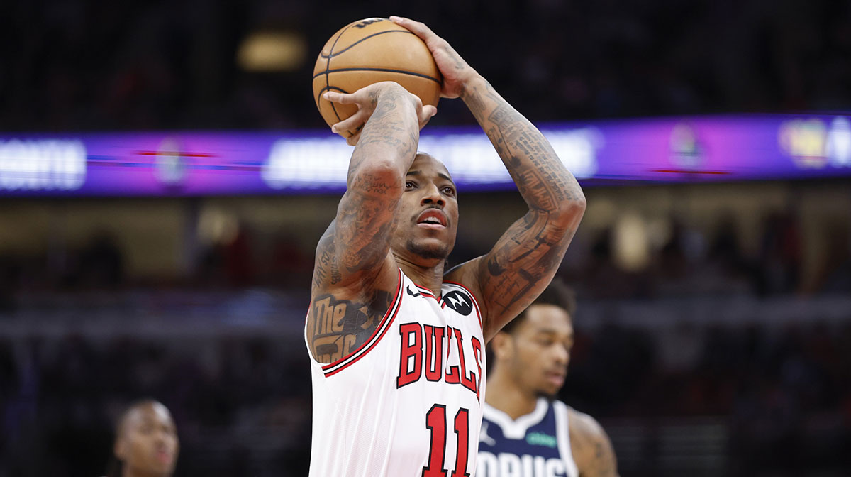 Chicago Bulls forward DeMar DeRozan (11) shoots a free throw against the Dallas Mavericks during the first half at United Center.